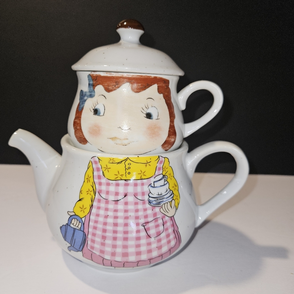 Adorable speckled ceramic teapot cup lid stackable featuring a woman 1970s